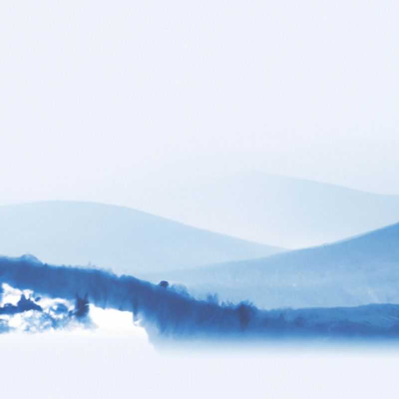 Six skiers bundled up against the cold, enjoying the thrill of gliding down the pristine slopes of Sugarloaf, USA, during their five-day ski vacation. The majestic mountain backdrop and snow-covered trees create a breathtaking winter wonderland.