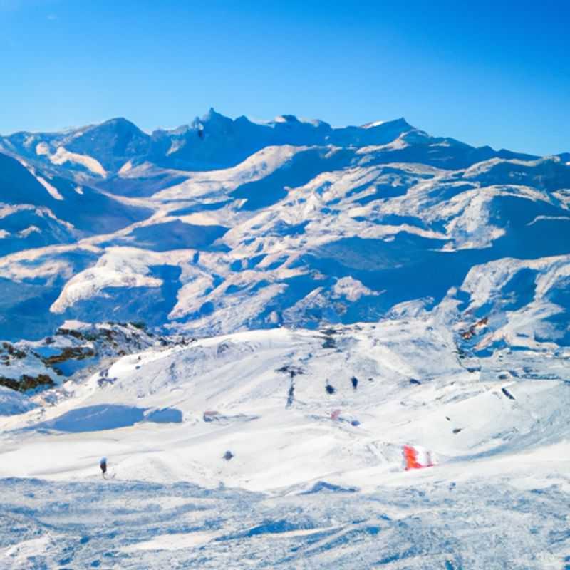 A solo traveler conquers the legendary slopes of Alpe d'Huez, France, during a thrilling 24-hour ski adventure, embracing the exhilaration and freedom of the snow-covered peaks.