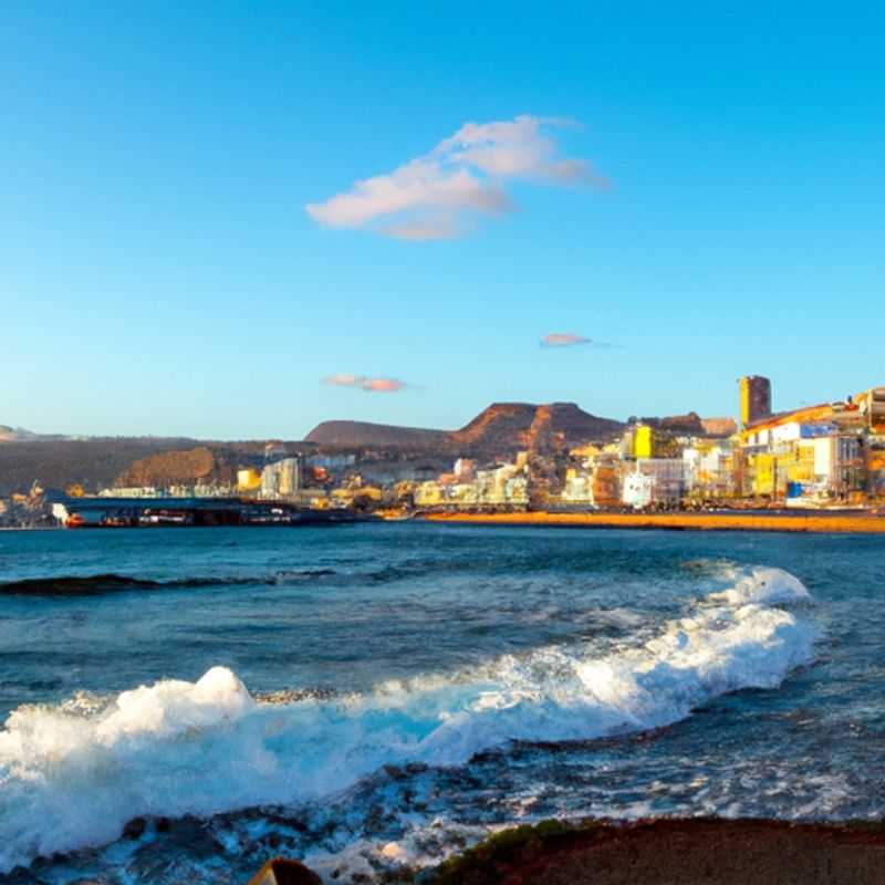 A solo traveler and digital nomad basking in the vibrant atmosphere of Las Palmas de Gran Canaria, Spain, during a 2-week winter sojourn. The image captures the essence of this Canary Island gem, showcasing its stunning urban beach, Playa de Las Canteras, and the iconic Auditorio Alfredo Kraus concert hall, a symbol of the city's cultural allure.